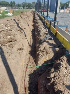 Installation of buried perimeter earth grid