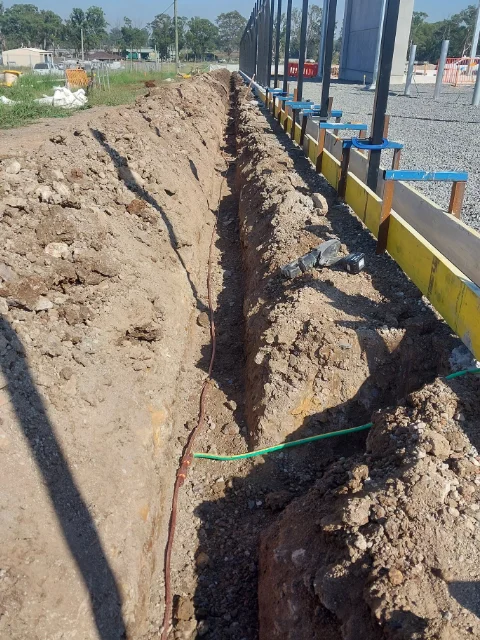 Installation of buried perimeter earth grid