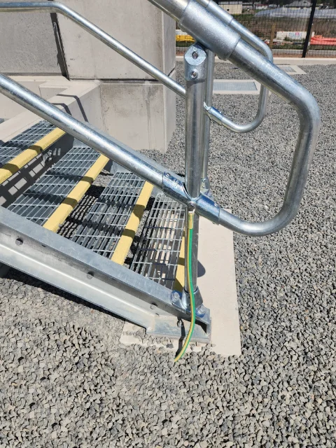Connection to stair handrail